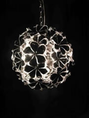 Inspired by flower bouquets Lotus gives you a choice of black or white blossoms. Each flower is handmade in Murano glass for a perfect finish. 3 sizes to suit various interiors.